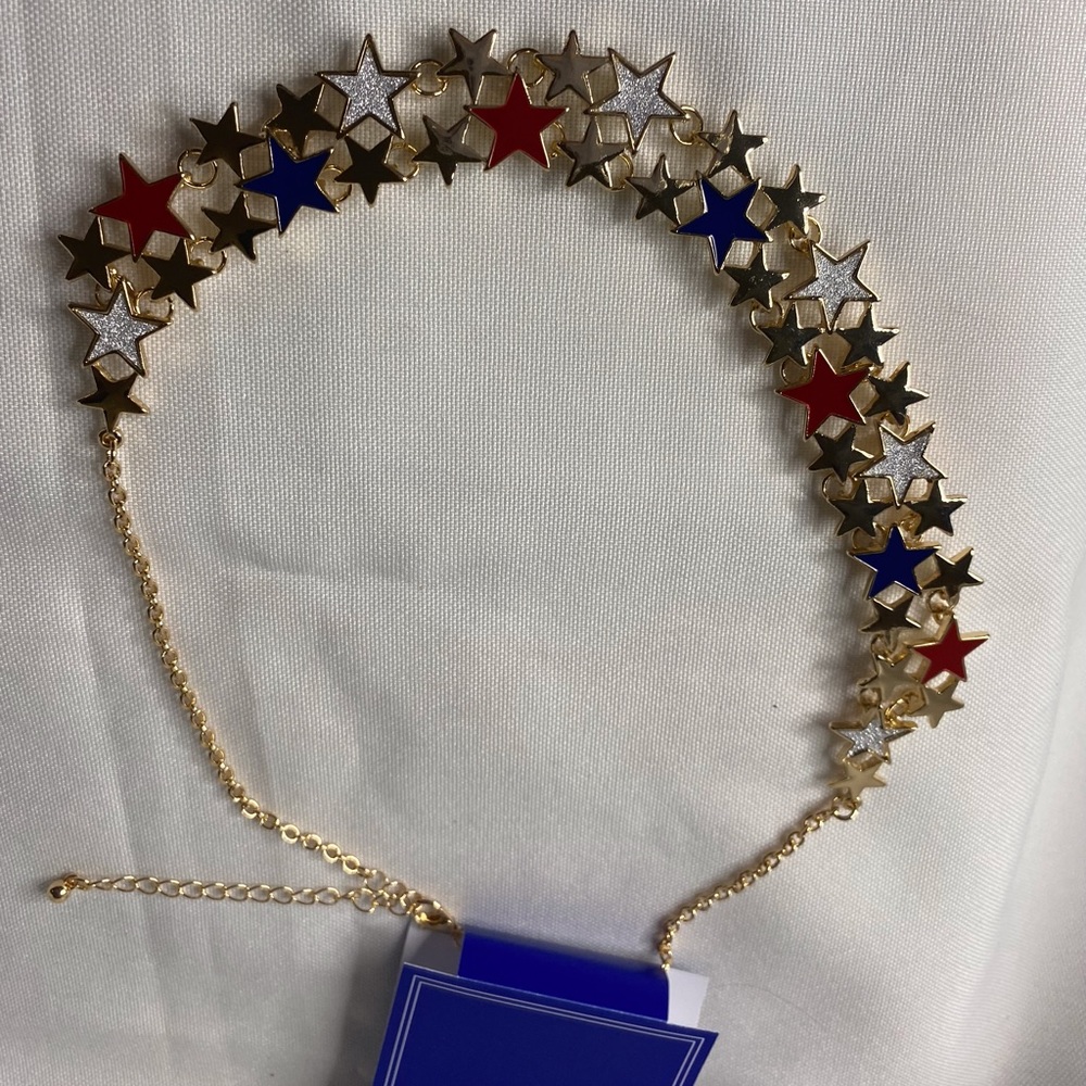 Gold neckless with with cute red, blue and silver stars $20